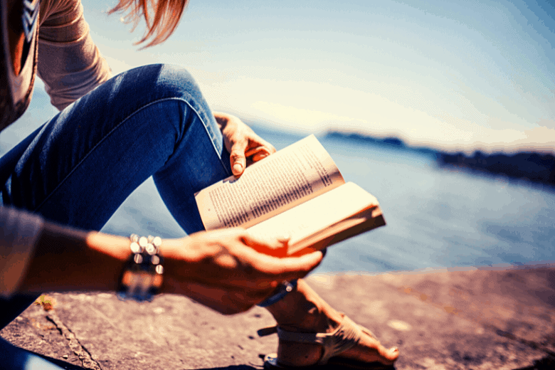 Woman Reading at beach