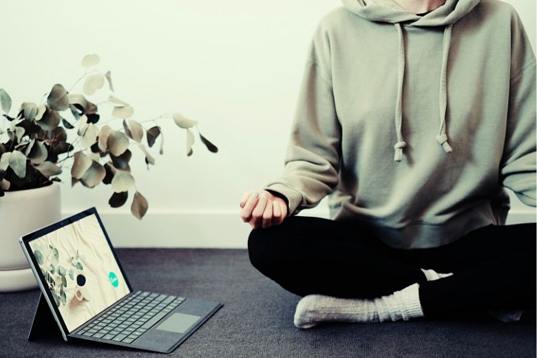 woman siting in a meditative position